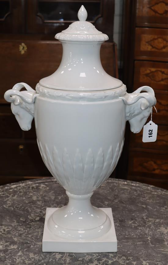 A 19th century Furstenburg white glazed urn and cover overall height 59cm